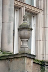 A ‘tea-urn’ above the door on Victoria Square House.